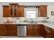 Elegant kitchen featuring granite countertops, stainless steel appliances, and stylish cabinets at 7413 S Elliott St, Tampa, FL 33616