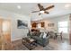 Stylish living room and kitchen, with a contemporary design and comfortable seating at 7413 S Elliott St, Tampa, FL 33616