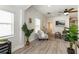 Bright and airy living room with modern furnishings and a soothing color palette at 7413 S Elliott St, Tampa, FL 33616