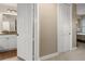 Bright bathroom boasts granite counters, white cabinets, and neutral tones at 95 Vivante Blvd # 204, Punta Gorda, FL 33950