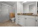 Clean bathroom features a glass-enclosed shower and granite vanity at 95 Vivante Blvd # 9524, Punta Gorda, FL 33950