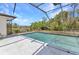 Private screened-in pool with a spacious patio, perfect for entertaining and enjoying the Florida sunshine at 1372 Annette St, Punta Gorda, FL 33980