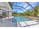 Inviting screened-in pool with patio and well-maintained landscaping offers a relaxing outdoor space at 1372 Annette St, Punta Gorda, FL 33980