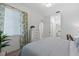 Bedroom with soft lighting, bright walls, and a peaceful view at 14061 Heritage Landing Blvd # 445, Punta Gorda, FL 33955