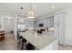 Modern kitchen with granite countertops, stainless steel appliances, and a convenient breakfast bar at 14061 Heritage Landing Blvd # 445, Punta Gorda, FL 33955