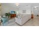 Cozy living room with comfortable seating, a stylish TV console, and a serene ambiance at 14061 Heritage Landing Blvd # 445, Punta Gorda, FL 33955