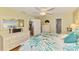 Large primary bedroom boasts a king-size bed, lots of storage, and two entryways at 142 Rotonda Cir, Rotonda West, FL 33947