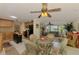 Open concept kitchen with center island and connection to dining area at 142 Rotonda Cir, Rotonda West, FL 33947