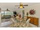Open concept living space with multiple rooms and plenty of sunlight at 142 Rotonda Cir, Rotonda West, FL 33947