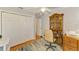 Home office featuring a large closet, desk, and a wooden hutch, creating a functional workspace at 142 Rotonda Cir, Rotonda West, FL 33947