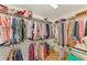 Spacious walk-in closet with ample storage space and wire shelving for organized clothing and accessories at 142 Rotonda Cir, Rotonda West, FL 33947