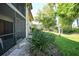 Lush and well-kept community backyard with mature trees and landscaping at 1515 Forrest Nelson Blvd # N101, Port Charlotte, FL 33952