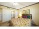 The bedroom includes a ceiling fan and access to an ensuite bathroom at 1515 Forrest Nelson Blvd # N101, Port Charlotte, FL 33952