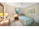 Bright bedroom with a twin bed, dresser, and bright window view at 1515 Forrest Nelson Blvd # N101, Port Charlotte, FL 33952
