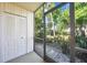 Screened in Lanai with lush backyard views and extra closet storage at 1515 Forrest Nelson Blvd # N101, Port Charlotte, FL 33952