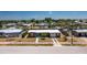 Expansive aerial view of a cozy home nestled in a tranquil neighborhood with canals at 159 Godfrey Ne Ave, Port Charlotte, FL 33952