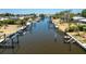 Scenic view of a canal lined with private docks and waterfront living at 159 Godfrey Ne Ave, Port Charlotte, FL 33952