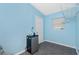 Walk-in closet with wire shelving and mini refrigerator at 159 Godfrey Ne Ave, Port Charlotte, FL 33952