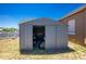 Spacious storage shed adjacent to a pool, perfect for outdoor equipment at 159 Godfrey Ne Ave, Port Charlotte, FL 33952