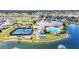 Beautiful community amenities including a pool, tennis courts, and clubhouse at 1678 Royal Ct, Punta Gorda, FL 33980