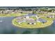 Beautiful homes around a lake, creating a tranquil and picturesque setting at 1678 Royal Ct, Punta Gorda, FL 33980