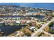 Scenic aerial view featuring waterfront homes with canal access and surrounding neighborhood at 1711 Boca Raton Ct, Punta Gorda, FL 33950