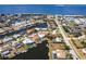 Waterfront neighborhood with canal access and various roof colors at 1711 Boca Raton Ct, Punta Gorda, FL 33950