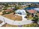 Beautiful waterfront home with a metal roof, lush greenery, and a private canal at 1711 Boca Raton Ct, Punta Gorda, FL 33950