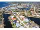 Stunning aerial shot of a waterfront neighborhood showcasing the beautiful canal front homes at 1711 Boca Raton Ct, Punta Gorda, FL 33950