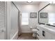 Cozy bathroom featuring a tub-shower combo, modern vanity, and tasteful decor at 1711 Boca Raton Ct, Punta Gorda, FL 33950