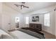 Comfortable bedroom featuring neutral tones, ample natural light, and calming decor at 1711 Boca Raton Ct, Punta Gorda, FL 33950