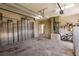 Spacious garage featuring ample storage, laundry hook ups, and access to the main house at 1711 Boca Raton Ct, Punta Gorda, FL 33950