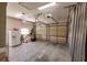 Spacious two-car garage featuring a high ceiling and ample storage space at 1711 Boca Raton Ct, Punta Gorda, FL 33950