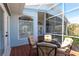 Comfortable seating on the lanai offers a nice place for entertainment at 1711 Boca Raton Ct, Punta Gorda, FL 33950