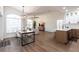 Modern living space with a combined dining area and an open kitchen concept at 1711 Boca Raton Ct, Punta Gorda, FL 33950
