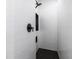 Contemporary shower with white subway tiles and matte black hardware at 1711 Boca Raton Ct, Punta Gorda, FL 33950