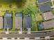 Bird's eye view of homes featuring screened pools and well-kept backyards at 17459 Palmetto Pass Ln, Punta Gorda, FL 33982