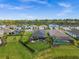 Backyards with screened-in pools, fenced lawns, and landscaping at 17459 Palmetto Pass Ln, Punta Gorda, FL 33982