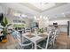 Elegant dining area seamlessly connecting to the kitchen and living space, perfect for gatherings and everyday living at 17459 Palmetto Pass Ln, Punta Gorda, FL 33982