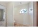 Bathroom with a toilet and tiled shower at 1856 Nuremberg Blvd, Punta Gorda, FL 33983