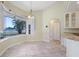 Sunlit dining area features a bay window with a view of the water at 1856 Nuremberg Blvd, Punta Gorda, FL 33983