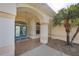 Inviting front entry with a tiled walkway, arched doorway, and a well-maintained exterior at 1856 Nuremberg Blvd, Punta Gorda, FL 33983