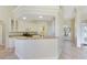 Bright kitchen features granite counters, breakfast bar, and modern appliances at 1856 Nuremberg Blvd, Punta Gorda, FL 33983