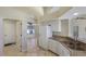Functional kitchen with granite countertops and ample cabinet space for all your cooking needs at 1856 Nuremberg Blvd, Punta Gorda, FL 33983