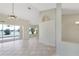 Spacious living area with tile floors, ceiling fan, and water view at 1856 Nuremberg Blvd, Punta Gorda, FL 33983
