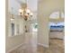 Open-concept living area featuring tile floors, neutral walls, and lots of natural light at 1856 Nuremberg Blvd, Punta Gorda, FL 33983