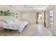 Bright main bedroom with neutral walls, and views to the outside at 1856 Nuremberg Blvd, Punta Gorda, FL 33983