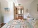Bright bedroom features hardwood floors and a closet, offering a serene retreat at 19505 Quesada Ave # Ii201, Port Charlotte, FL 33948
