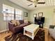 Inviting living room with comfortable seating, contemporary decor, and lots of natural light at 19505 Quesada Ave # Ii201, Port Charlotte, FL 33948