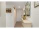 Bright entryway with tile floors, a decorative console table, and neutral wall color at 1999 Kings Hwy # 24C, Punta Gorda, FL 33980